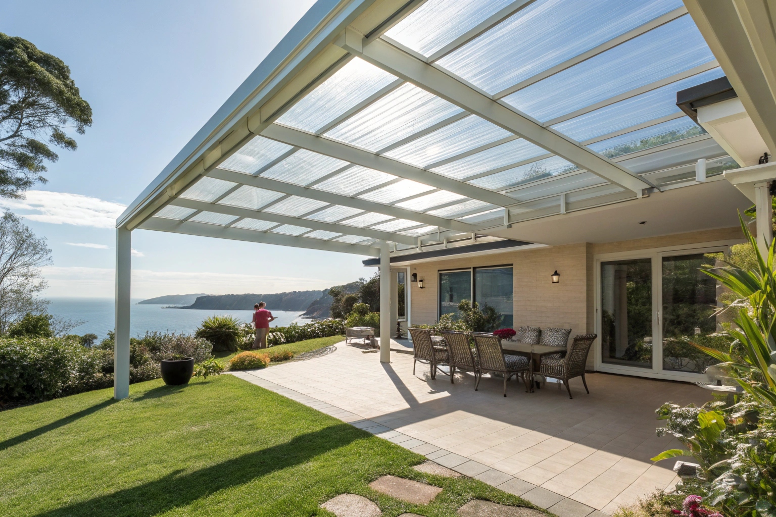 Polycarbonate roof panels covering outdoor patio area on Central Coast home with natural light