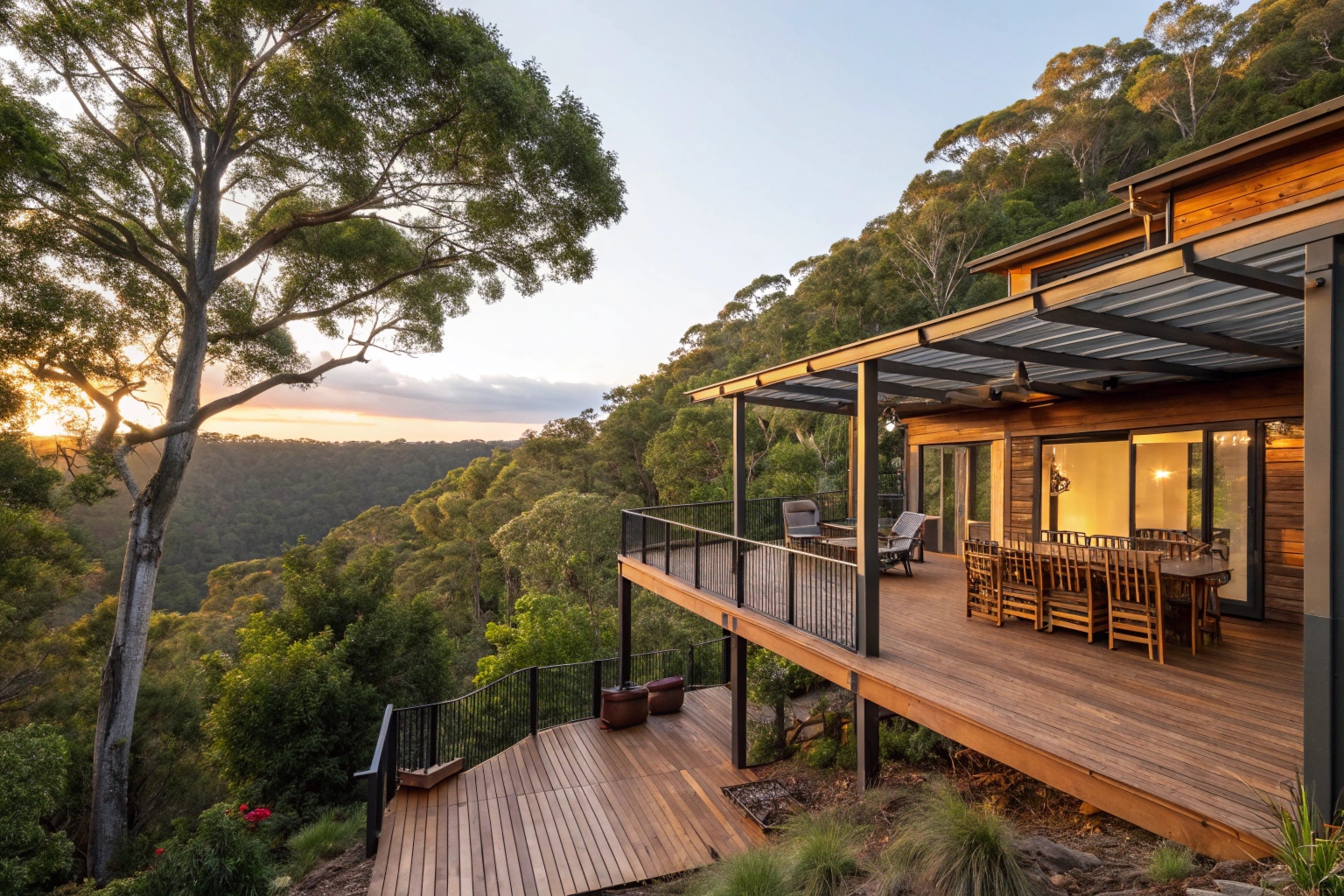 Elevated timber deck with pergola on sloping hillside block surrounded by Australian bushland, Picketts Valley Central Coast