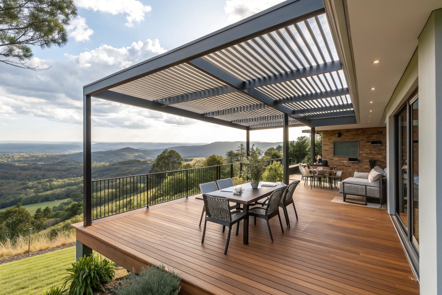 Multi-level deck and louvred pergola on sloping Central Coast property with valley views and outdoor entertaining area